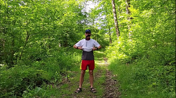 naked slave pig exposed in penis cage, outdoor strip in public woods, hiking, masturbate cumshot, BDSM