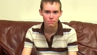 Skinny British twink cums after masturbating his fat dick