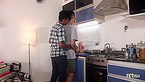 Two horny gay twinks have passional anal sex in the kitchen