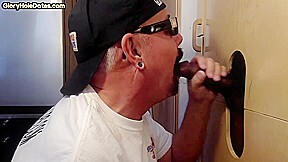 Gloryhole amateur DILF sucks black penis with greedy mouth