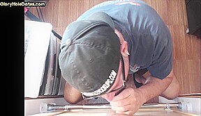 Gloryhole gay enjoys sucking big cock while jerking it