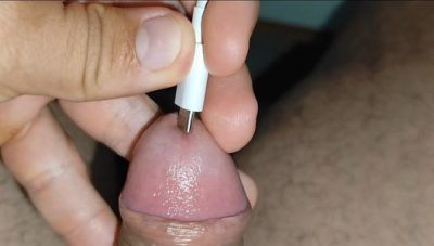 High-voltage charging plugged into the boy’s cock makes him horny.