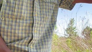 Log trucker handles his wood in the woods.