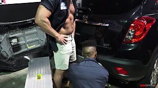 Muscular mechanic fucks his black employee in the shop